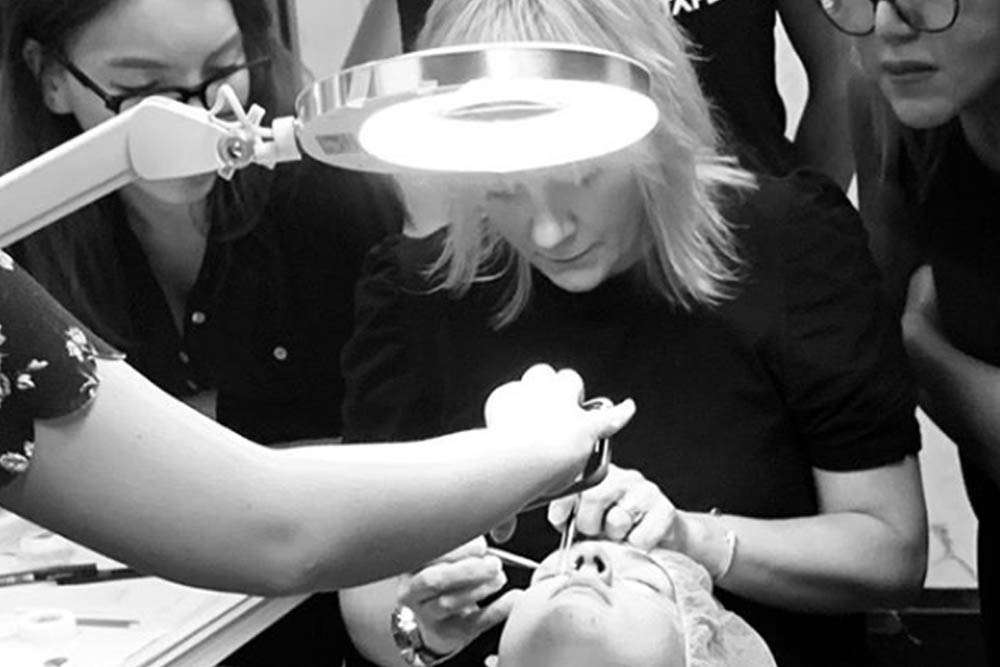 Jodie Watkins Shows Students how to Apply Eyelash Extensions