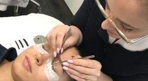 last artist applying Graft A Lash eyelash extensions